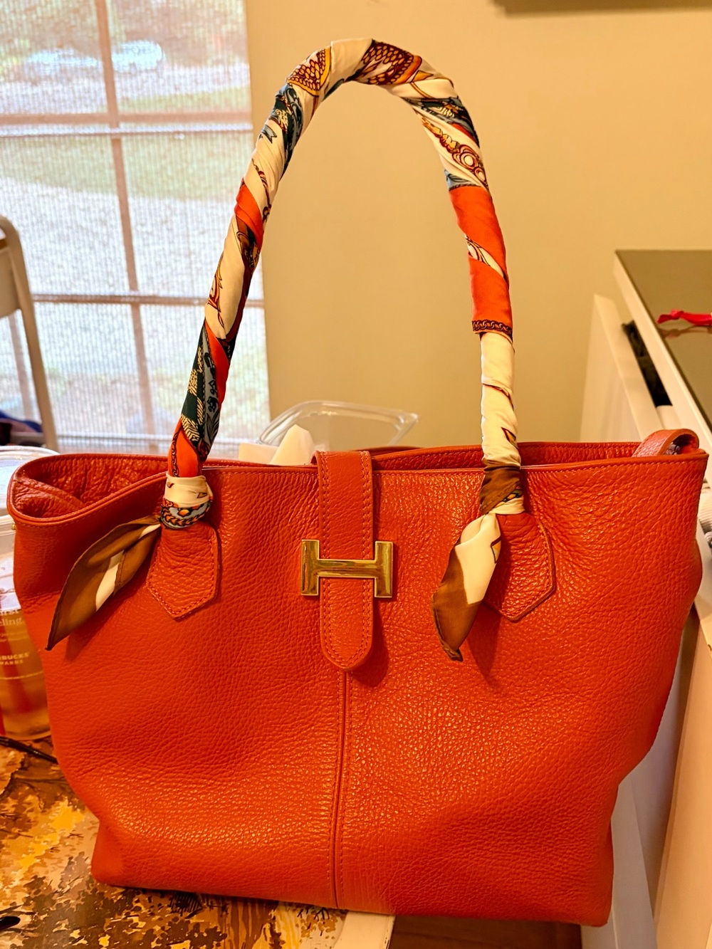 Textured Orange Leather Shoulder Tote with Decorative Scarf Wrap
